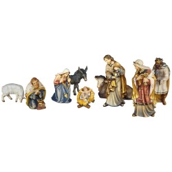 Le 10 statuine in legno del Presepe Kostner su sfondo bianco senza capanna